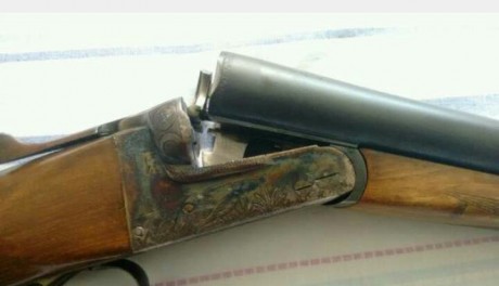 vendo escopeta paralela pioner , caño de 66 ( sin cortar ) , 4 y 2 estrellas , maderas en perfecto estado 02