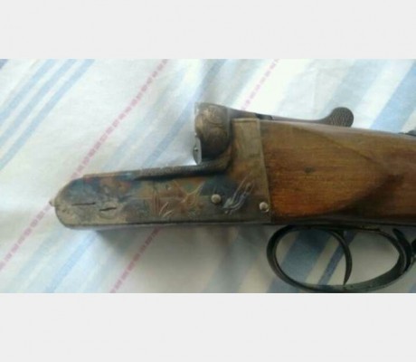 vendo escopeta paralela pioner , caño de 66 ( sin cortar ) , 4 y 2 estrellas , maderas en perfecto estado 21