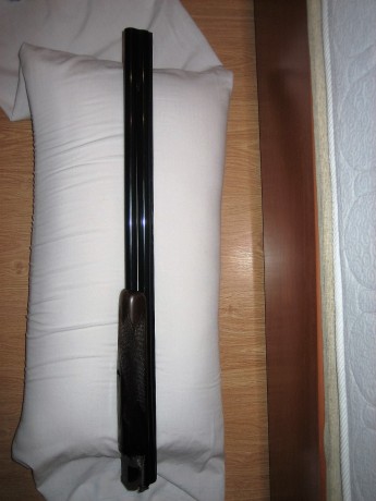 Hola.  Vendo escopeta superpuesta, de 74cm. de cañón, expulsora,  choques fijos de una y dos estrellas, 20