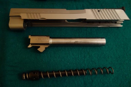 Vendo Sig Sauer P226 x-five allround del calibre 40SW con cañón adicional del 9mmP. Cinco pulgadas. Está 21
