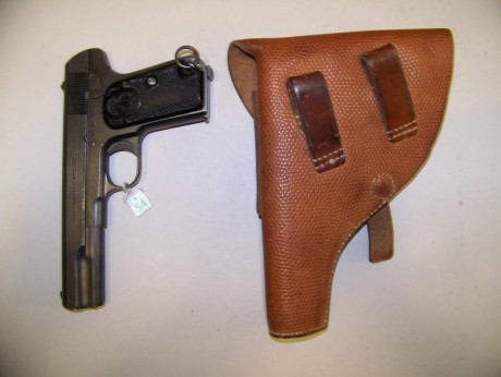 vendo   pistola. funda y portes 1300 €  calibre 9 milímetros en tiro libro de coleccionista envio incluido 91