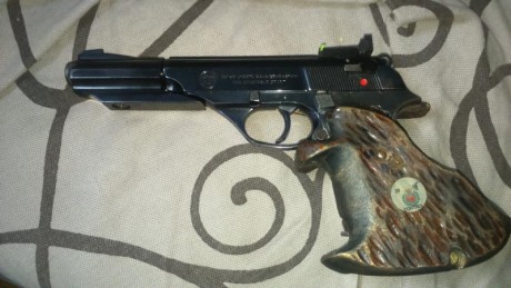 Vendo Astra Constable Sport cal.22LR con cachas anatómicas y otro alza original  nueva en su bolsita.
 01
