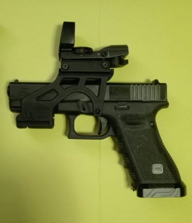Vendo visor punto rojo y soporte para pistola glock.  El visor tiene 4 retículas distintas.
precio del 01