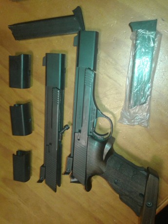 Vendo pistola alemana marca erma bien conocida por los tiradores dos carros 32 y 22 cachas anatómicas 02