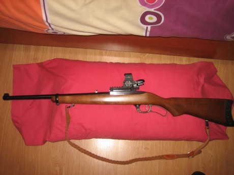 Hola.  Vendo este rifle, con cuatro cargadores de 4 disparos, cantonera de caucho y  la original, anillas 81