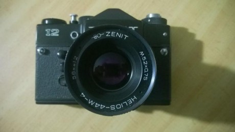    

Cámara refex Zenit 12 fabricada en 1986, con objetivo Helios 44M-4 todo en perfecto estado. 60€ con 11