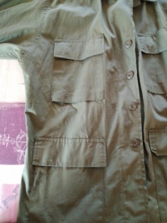 Vendo esta camisa verde oliva  de cuatro bolsillo de la marca Rothco , es de algodon y de tela ripstop, 12