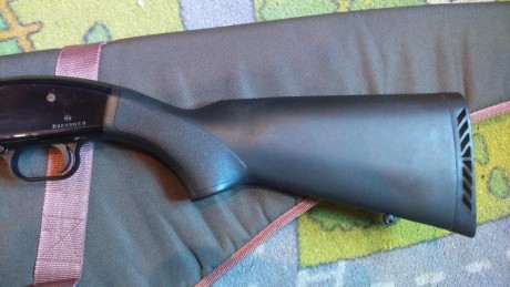 Mossberg-Maverick con dos caňones, uno corto cilíndrico y uno de caza con 4 chockes y solista ventilada.
Muy 32