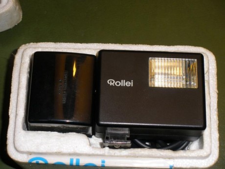 Cambio cámara de fotos ROLLEI impecable con flash y funda originales por banco de tiro. Tlfno.: 663419983 01