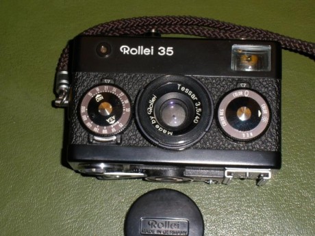 Cambio cámara de fotos ROLLEI impecable con flash y funda originales por banco de tiro. Tlfno.: 663419983 00