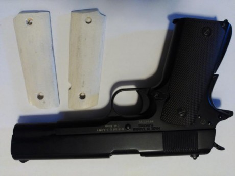 Vendo por 80€ o cambio por visor curioso ésta réplica oficial de la Colt 1911.
Prácticamente no tiene 02