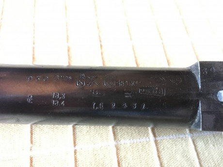 Buenas, tengo una escopeta de caza que era de mi bisabuelo la cual me gustaría saber la marca, el valor 02