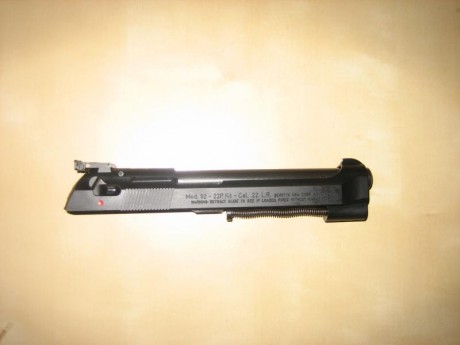 Hola. Vendo Beretta 92G mas carro del 22Lr. fabricado por Beretta. No mas de 70 disparos, con todos sus 72