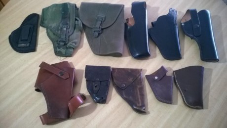  

Varias fundas, de izquierda superior :
Uncle Mike´s talla 12, (Glock 26,27,33, Taurus PT111...), Ejercito 00