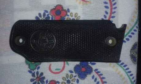 Hola compañeros, he adquirido una preciosa astra 400. Pero me he dado cuenta que una de las cachas fue 01