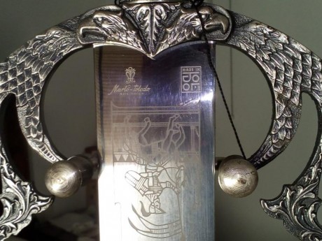 Pues eso compañeros,de mi visita a Toledo me compré una espada de Marto y ahora mi pregunta es,¿tiene 01