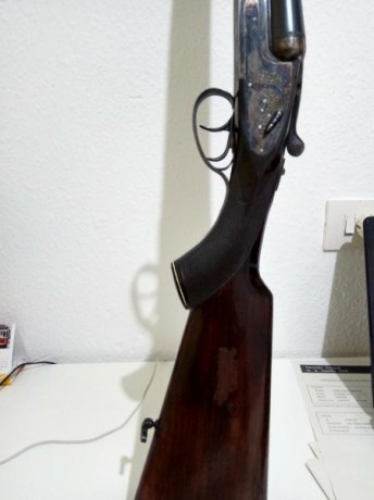 Cambiaría por rifle semiautomático, aportando diferencia. Escopeta paralela Aya, posiblemente modelo 116? 12