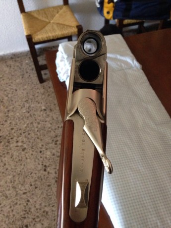 Vendo escopeta Laurona Trap impecable, pocos tiros.  Maletin de transporte, 76 cm de cañon, polichoques 01