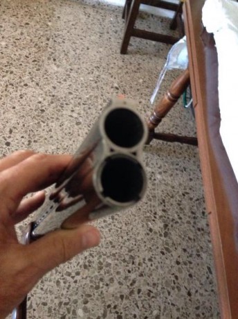 Vendo escopeta Laurona Trap impecable, pocos tiros.  Maletin de transporte, 76 cm de cañon, polichoques 00