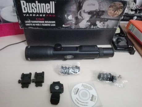 Se VENDE O CAMBIA visor Bushnell Yardage 4-12-x42, con telémetro incorporado (hasta 800 yardas), retícula 02
