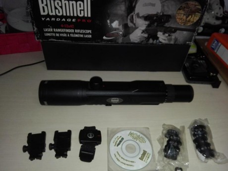 Se VENDE O CAMBIA visor Bushnell Yardage 4-12-x42, con telémetro incorporado (hasta 800 yardas), retícula 01