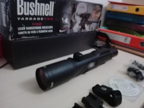 Se VENDE O CAMBIA visor Bushnell Yardage 4-12-x42, con telémetro incorporado (hasta 800 yardas), retícula 00