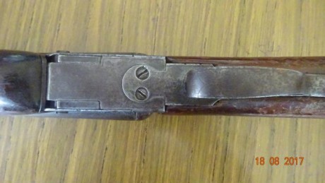 Podrían ayudarme con la identificación de esta escopeta,  no se alcanza a ver ningún marcaje del fabricante; 00
