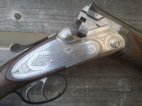 Beretta s2 caza en muy buen estado, dos gatillos primero articulado, 71 cms cañon 4 y 2 estrellas. Aceros 02