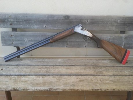 Beretta s2 caza en muy buen estado, dos gatillos primero articulado, 71 cms cañon 4 y 2 estrellas. Aceros 01