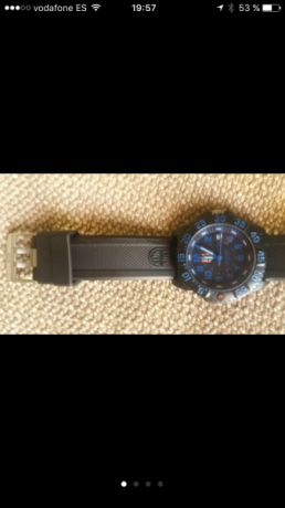 Reloj estilo militar, agujas y dial en tritio, brilla con luz propia en la oscuridad. Está muy bien cuidado 22