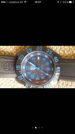 Reloj estilo militar, agujas y dial en tritio, brilla con luz propia en la oscuridad. Está muy bien cuidado 21