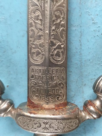 Vendo espadin de gala de la fabrica de Toledo, año 1899. 
Un saludo. 00