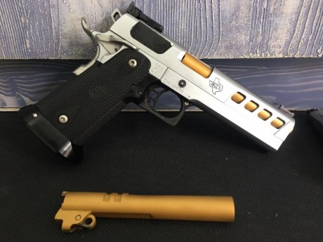 OPORTUNIDAD!VENDO PISTOLA STI EDGE CUSTOMIZADA DEL CALIBRE 40S&W MAS UN CAÑÓN ADICIONAL DEL 9PB,CON 10