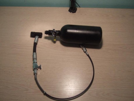 Hola, necesito ayuda porfavor, 
cargo las carabinas en el campo con esta botella de airsoft, a la que 02