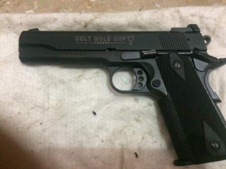 vendo pistola colt cal 22 con dos cargadores y maletin original poco uso pre3cio 250 e 01