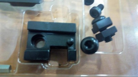 Pongo a la venta un juego de bases y anillas Optilock de 30 mm. La altura de las anillas es la "Medium". 01