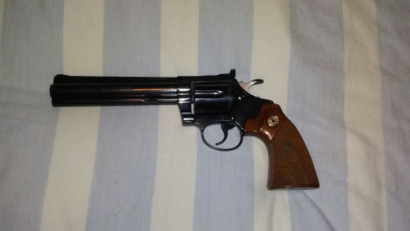 :duelo: Vendo mi precioso revolver diamante negro colt original en calibre 22 long rifle esta muy bien 01