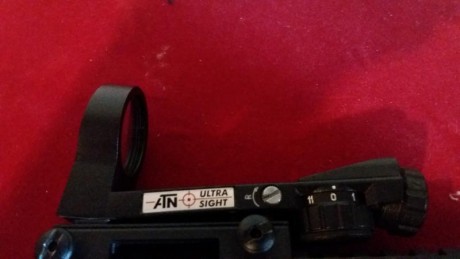 Visor de punto rojo marca ATN,  tiene distintas retículas y 11 puntos de intensidad. 
Se instala sobre 00