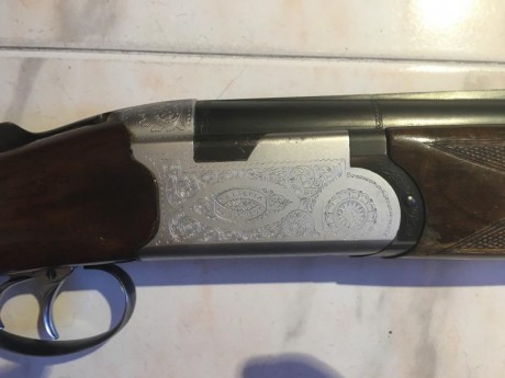 Escopeta de caza Beretta modelo S56E. Tiene chokes de 1 y 3 estrellas así como doble disparador, no selectivo. 22