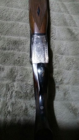 Un amigo me pasa esta escopeta que pone en venta. 
Cañon 69; 6 y 10 décimas. Recámaras 18.5
Cañones cromo-niquel. 12