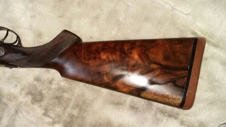 Un amigo me pasa esta escopeta que pone en venta. 
Cañon 69; 6 y 10 décimas. Recámaras 18.5
Cañones cromo-niquel. 11