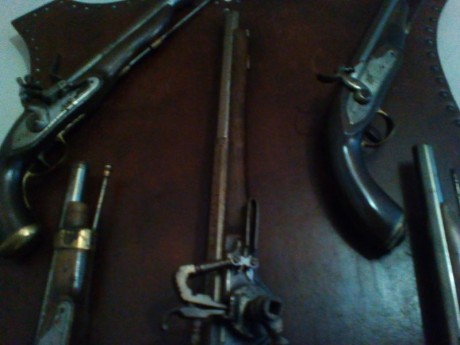 Hola tengo 5 pistolas, en una pone sTower y en otra 1771 y tres mas. Me gustaria saber el valor y si hay 21