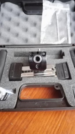 Se vende pistola HAMMERLI modelo SP20 RRS del calibre 32  y  carro del 22lr. Cola disparador recta , tambien 31