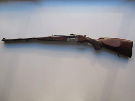 Vendo rifle express Merkel, modelo 141 E, 9,3 x 74R, pletinas con grabados de escenas de caza, y monturas 02