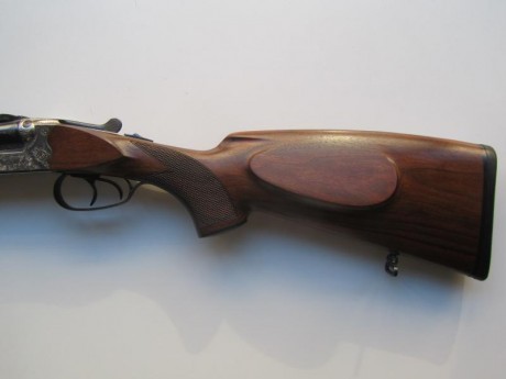 Vendo rifle express Merkel, modelo 141 E, 9,3 x 74R, pletinas con grabados de escenas de caza, y monturas 00