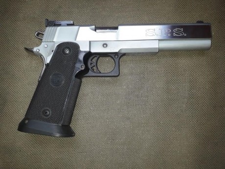 un amigo vende una pistola SPS de 9mm en 6 pulgadas , la pistola esta como nueva , tiene  muy pocos tiros 02