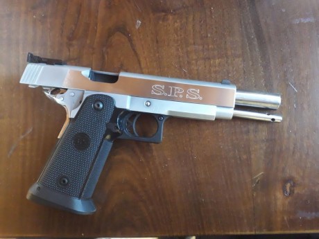 un amigo vende una pistola SPS de 9mm en 6 pulgadas , la pistola esta como nueva , tiene  muy pocos tiros 00