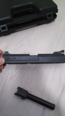 Hola, se vende (muy a mi pesar y por necesidad)  una preciosa HK USP match bicolor del 9 parabelum, dos 52