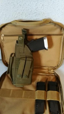 Se vende kjw kp 06 con 2 cargadores pistolera laser y maletin. Admite tambien cargadores de co2 .-totalmente 02