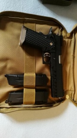Se vende kjw kp 06 con 2 cargadores pistolera laser y maletin. Admite tambien cargadores de co2 .-totalmente 01